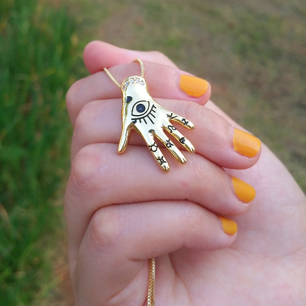 The Sacred Hand Pendant Necklace