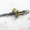 Sword With Crown Pendant